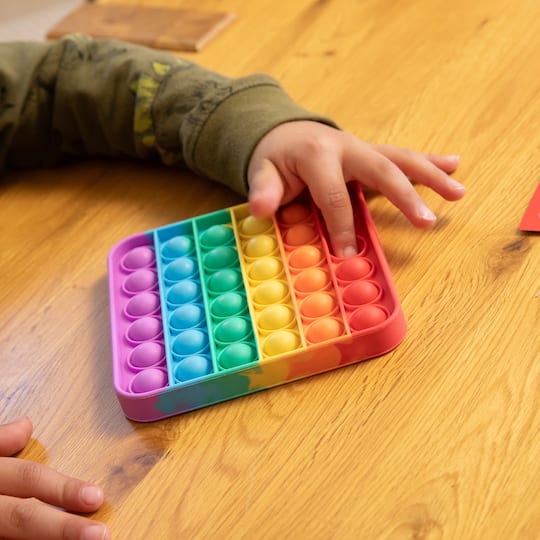 The Fidget Game 5" x 5" Rainbow Pop It Mats, 4ct.